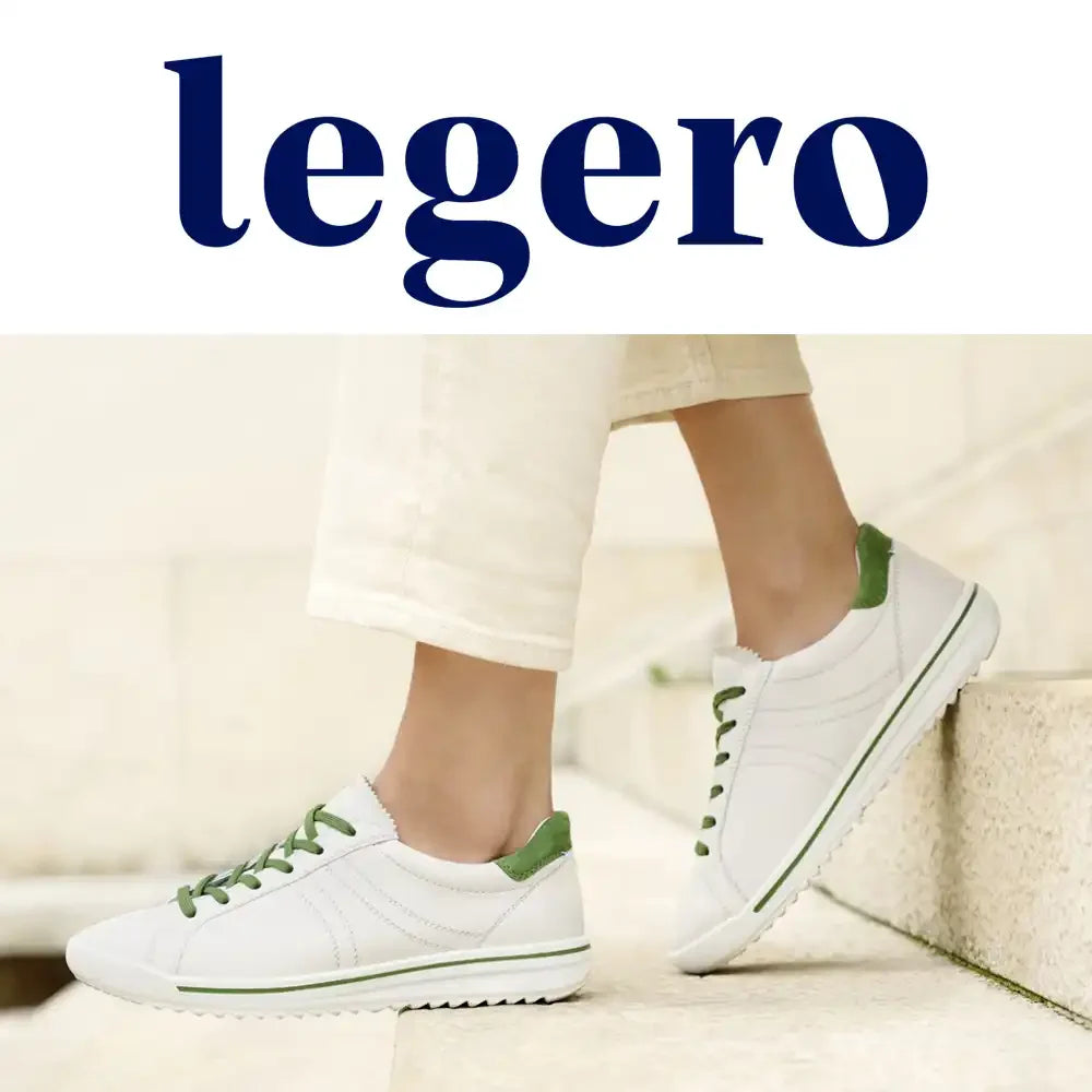 elegant woman sitting on stairs wearing legero aw25 shoes